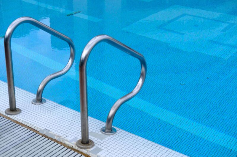 A photo of a ladder in a swimming pool