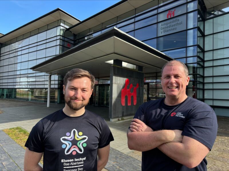 Lewis Bradley (left) of Swansea Bay Health Charity with Poppy Factory Navigator Paul Roberts