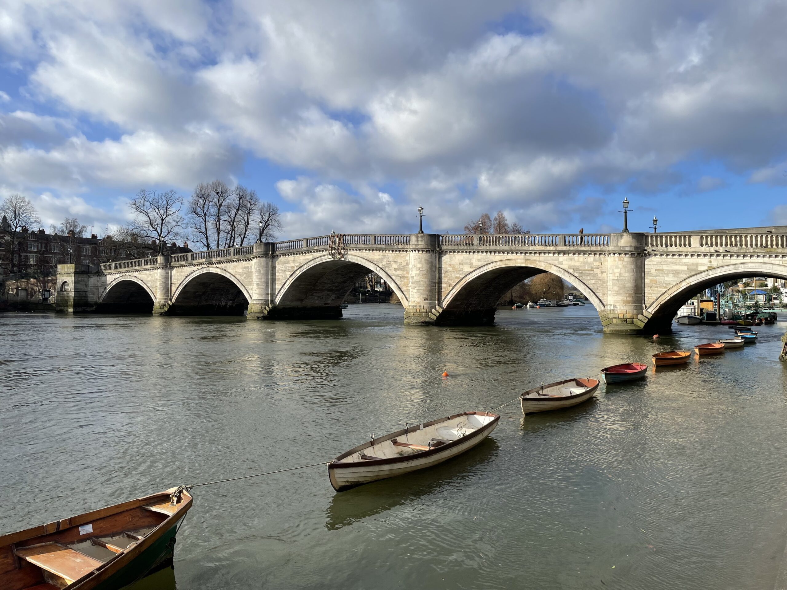 An image of Richmond Bridge with boats in the foreground